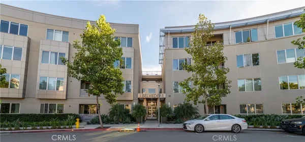 a view of a chairs and table in patio