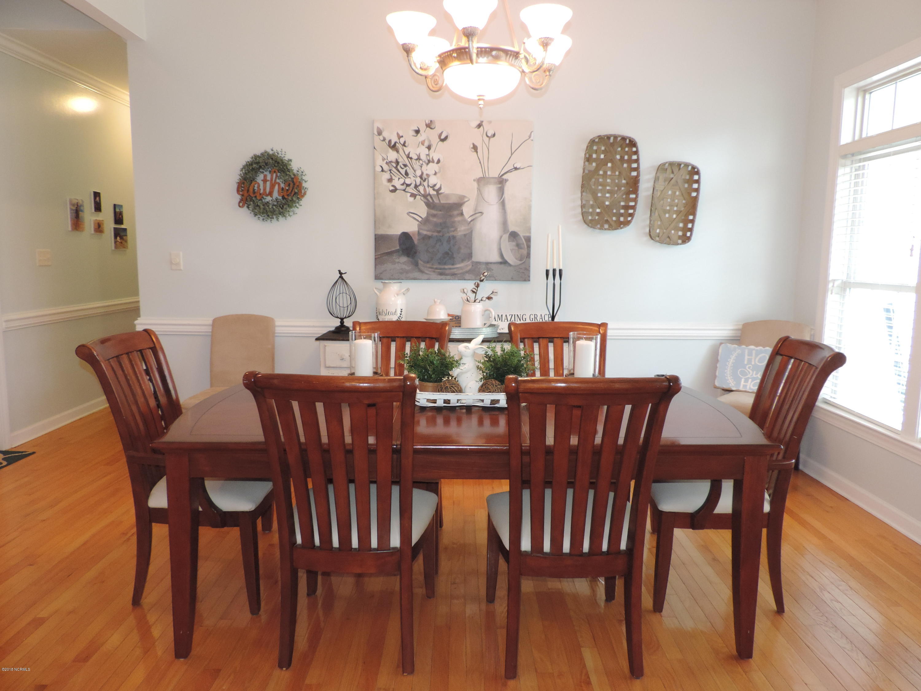 2121 Perrytown Loop Road New Bern, NC 28562 - Photo 4 of 35 Formal dining with chair rail detail