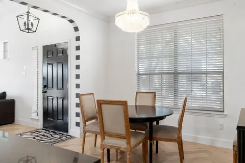a view of a dining room with furniture