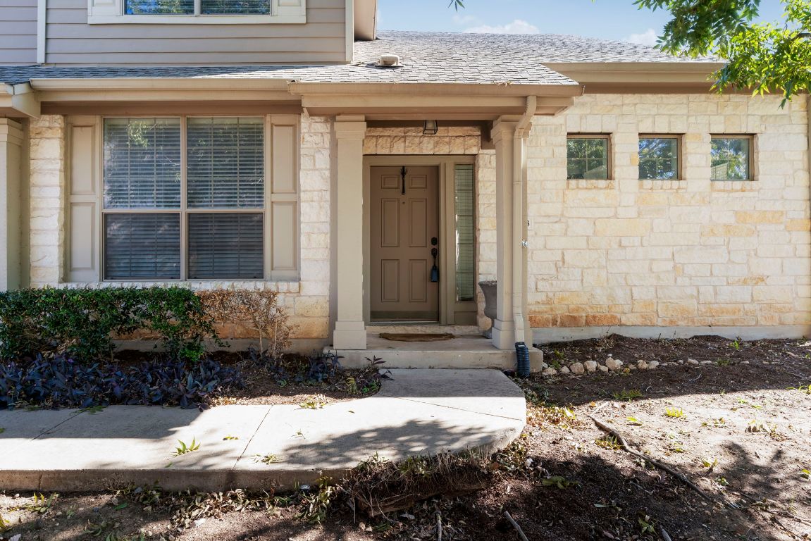 9201 Brodie Lane, Unit 2303 Austin, TX 78748 - Photo 2 of 26 a front view of a house