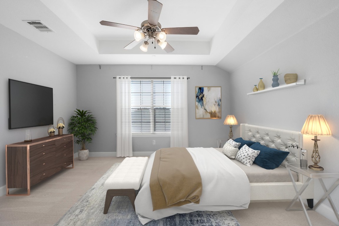 9201 Brodie Lane, Unit 2303 Austin, TX 78748 - Photo 22 of 26 a bedroom with a bed and a flat screen tv