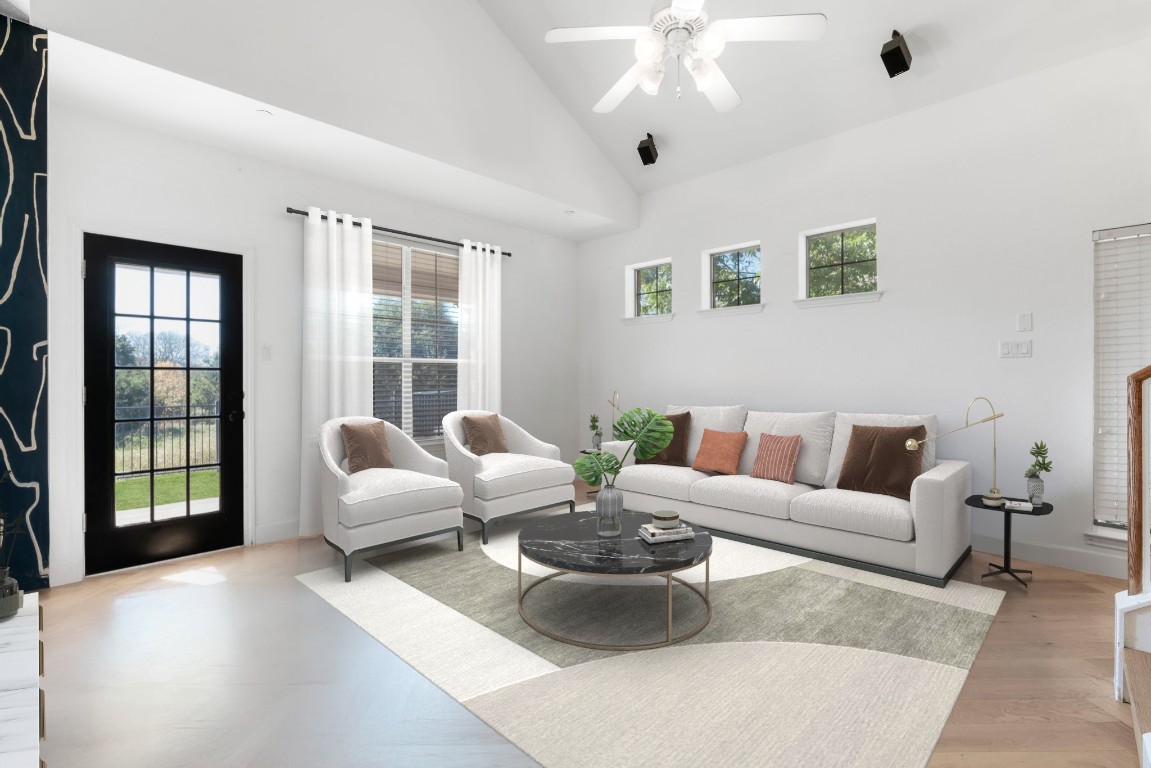 9201 Brodie Lane, Unit 2303 Austin, TX 78748 - Photo 4 of 26 a living room with furniture and a large window