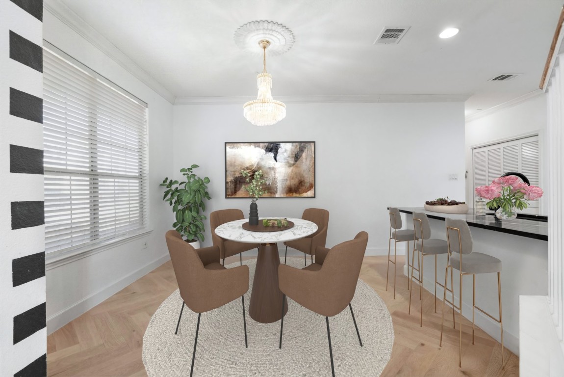 9201 Brodie Lane, Unit 2303 Austin, TX 78748 - Photo 7 of 26 a view of a dining room with furniture and wooden floor