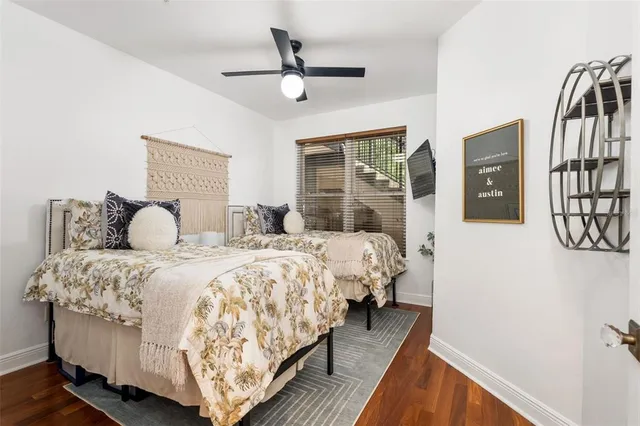 a bedroom with bed and a window