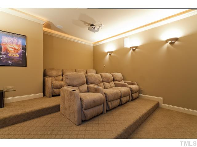 8402 Wheatstone Lane Raleigh, NC 27613 - Photo 23 of 25 HD Media Room. All equipment and chairs come with the home! Media Room