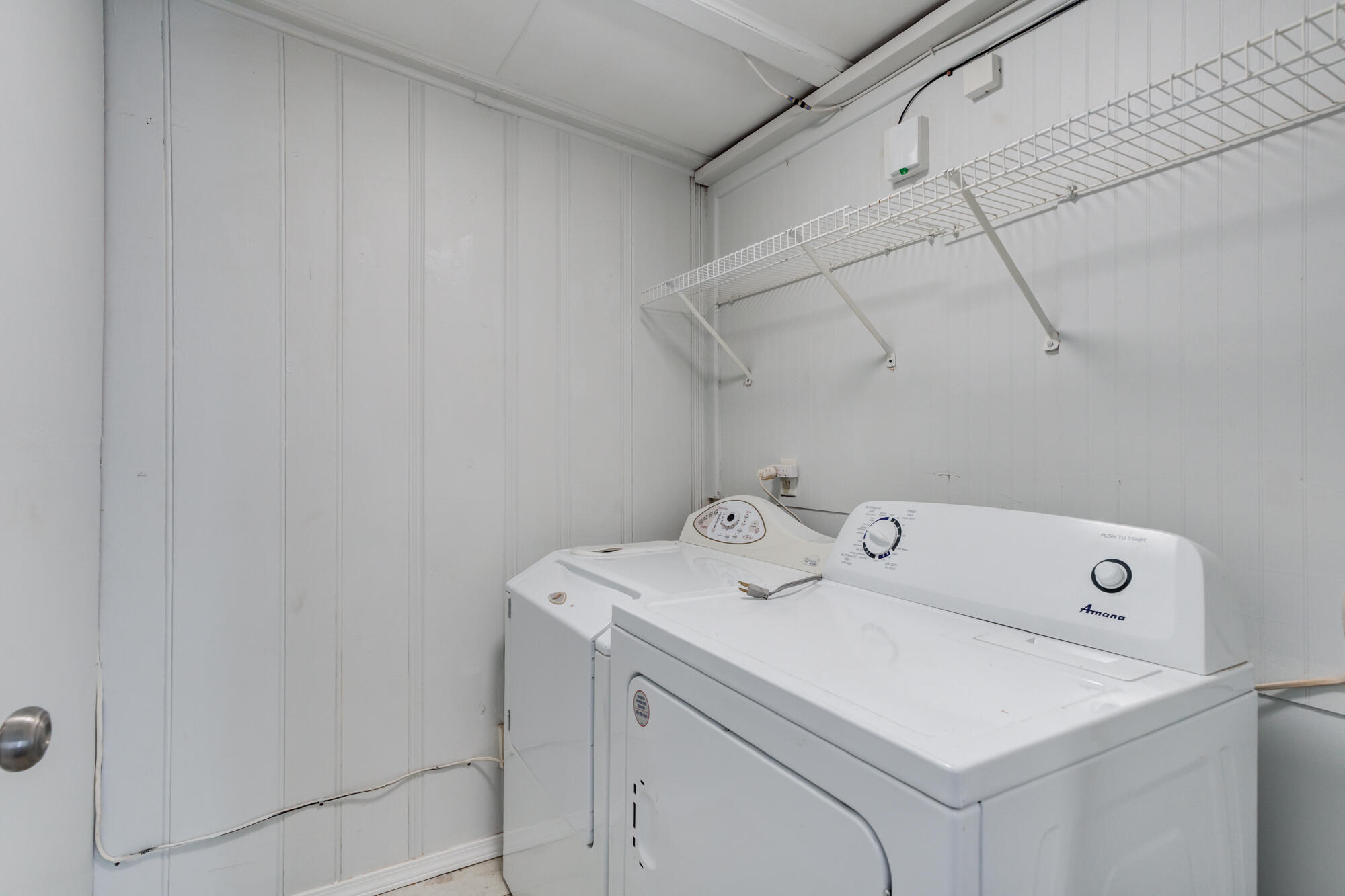 2629 24th Street Lubbock, TX 79410 - Photo 21 of 28 a utility room with dryer and washer