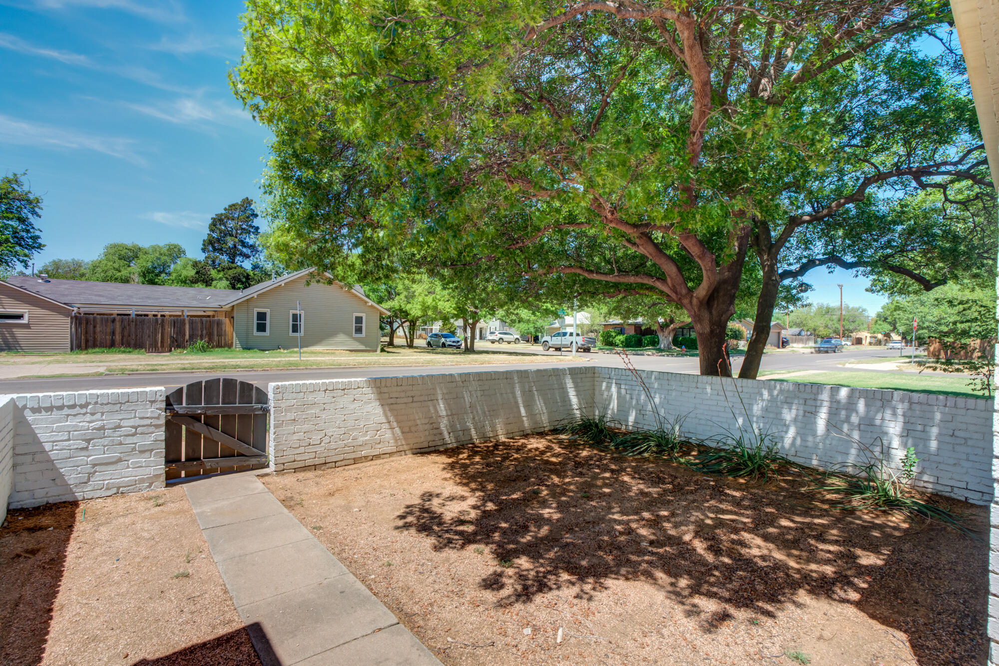 2629 24th Street Lubbock, TX 79410 - Photo 25 of 28 a view of a house with a yard