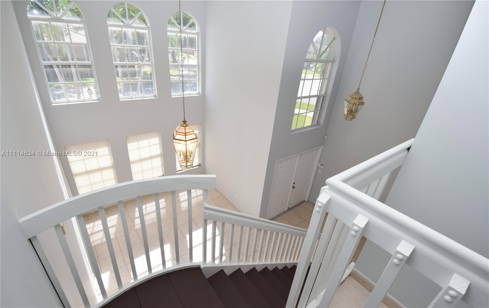 15381 Southwest 112th Terrace Miami, FL 33196 - Photo 17 of 43 a view of an entryway