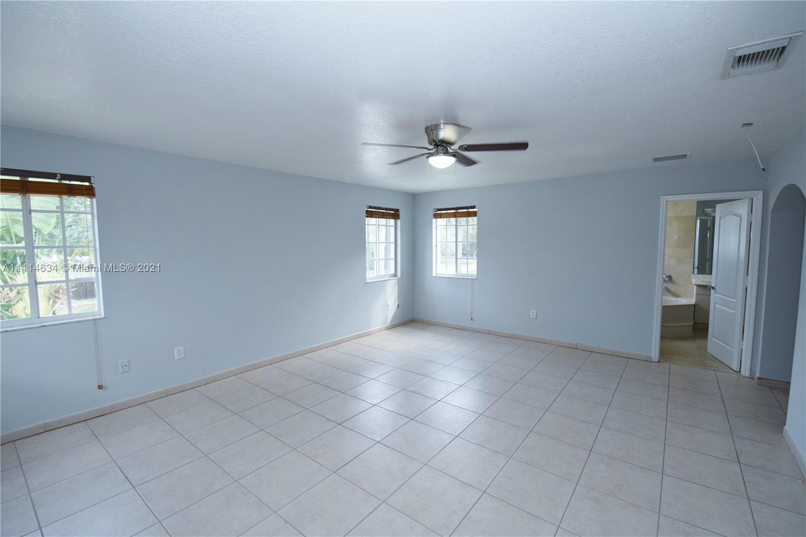 15381 Southwest 112th Terrace Miami, FL 33196 - Photo 23 of 43 a view of an empty room with a window