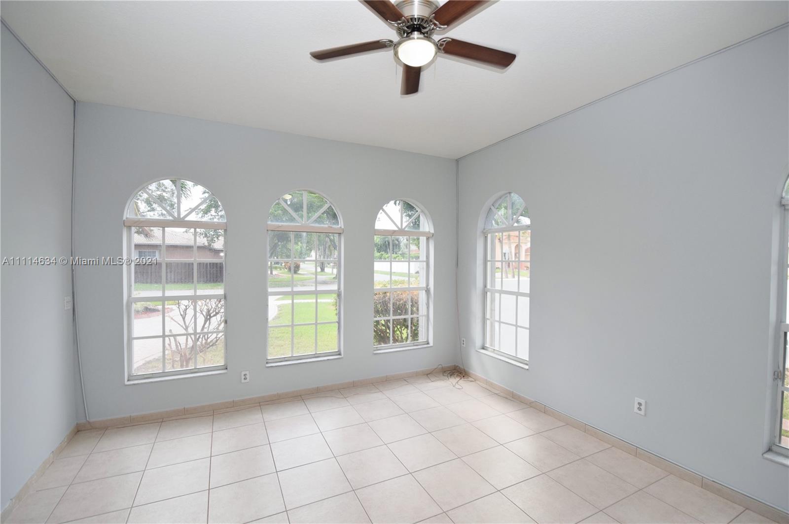 15381 Southwest 112th Terrace Miami, FL 33196 - Photo 30 of 43 a view of an empty room with a window