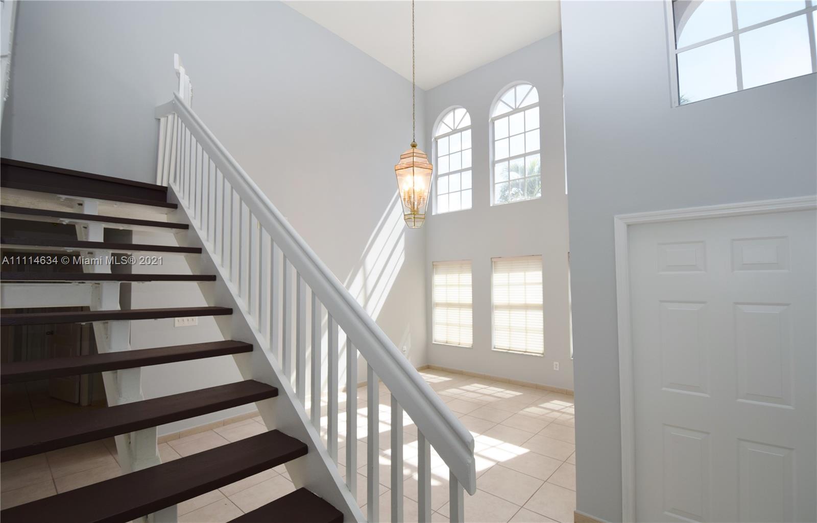 15381 Southwest 112th Terrace Miami, FL 33196 - Photo 10 of 43 a view of staircase with wooden floor and staircase