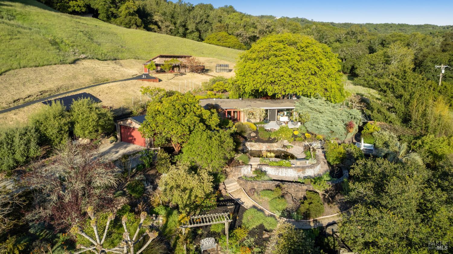 6960 Round Oak Road Penngrove, CA 94951 - Photo 4 of 58 a view of a bunch of flowers and trees