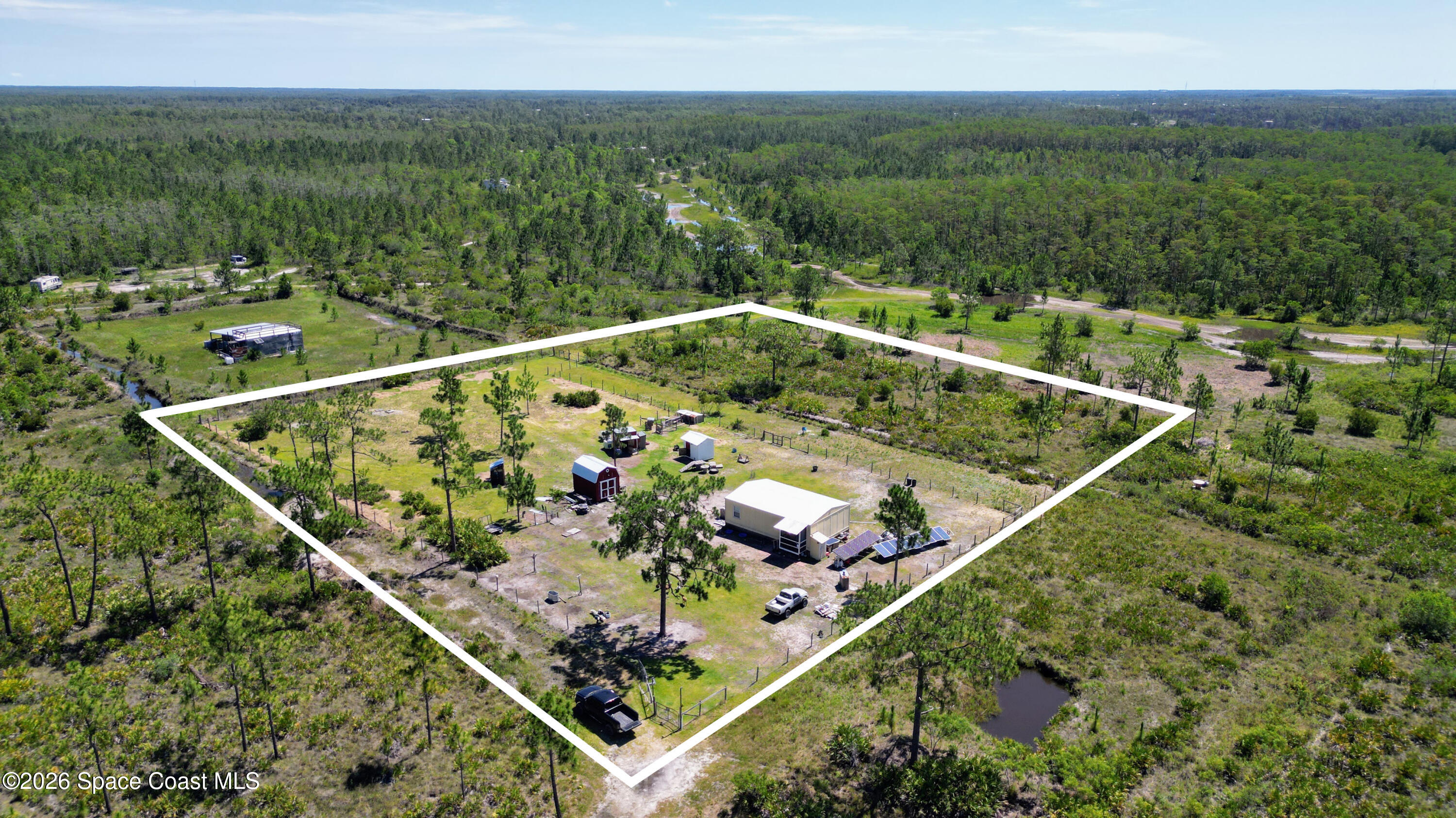 100 Holopaw Groves Rd Street St. Cloud, FL 34773 - Photo 1 of 21 exterior- aerial