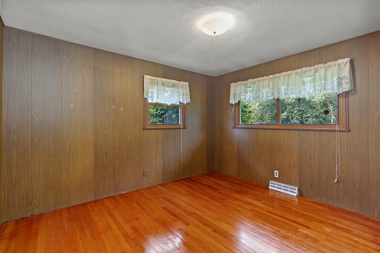 19 Durell Drive Kankakee, IL 60901 - Photo 14 of 25 a view of an empty room with wooden floor and a window