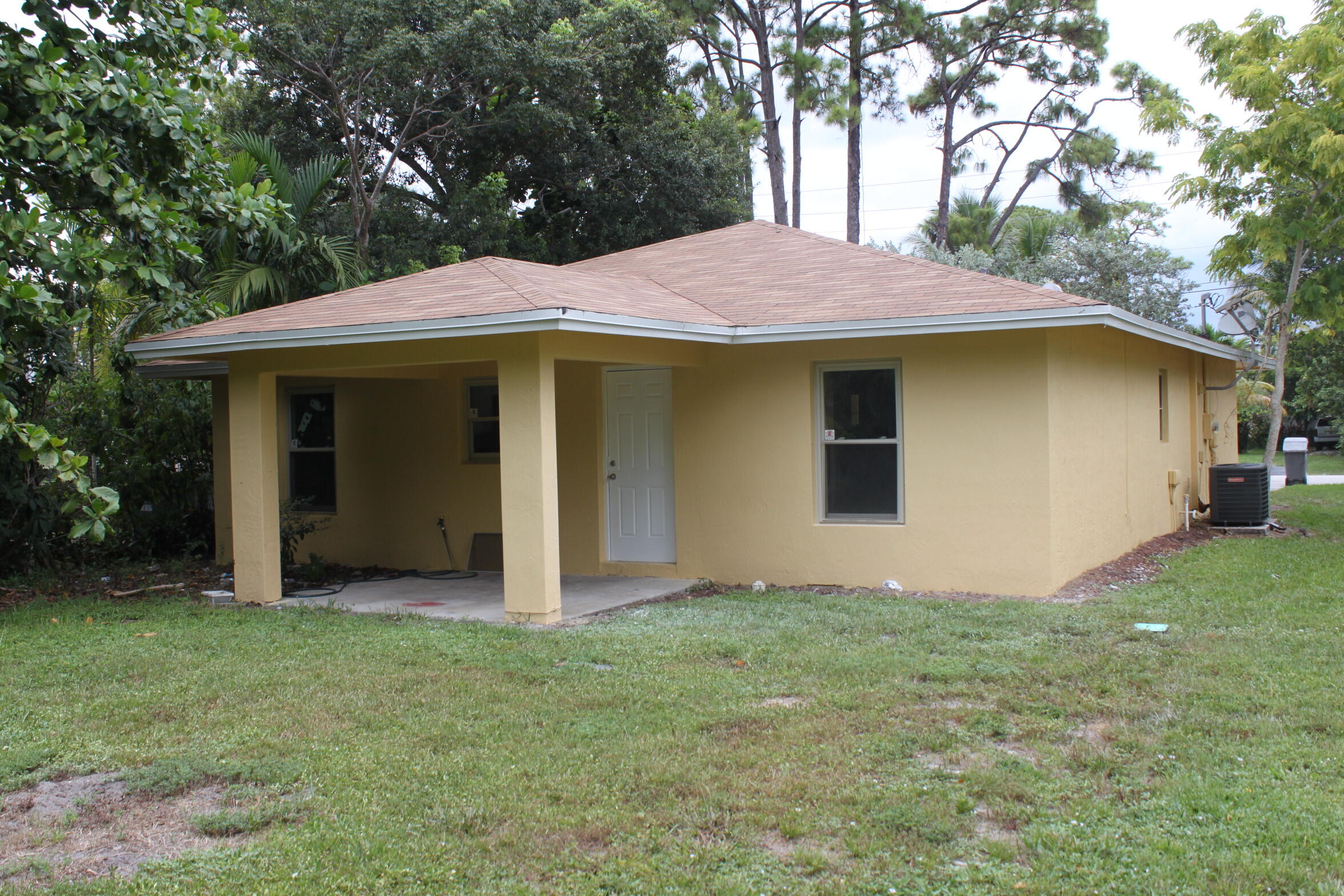 5930 Lime Road Royal Palm Estates, FL 33413 - Photo 3 of 23 IMG_5083
