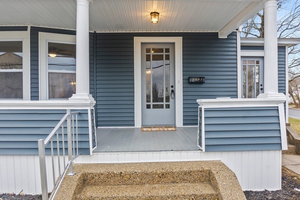 2191 Main Street Three Rivers, MA 01080 - Photo 4 of 42 a view of a house with a door and a window