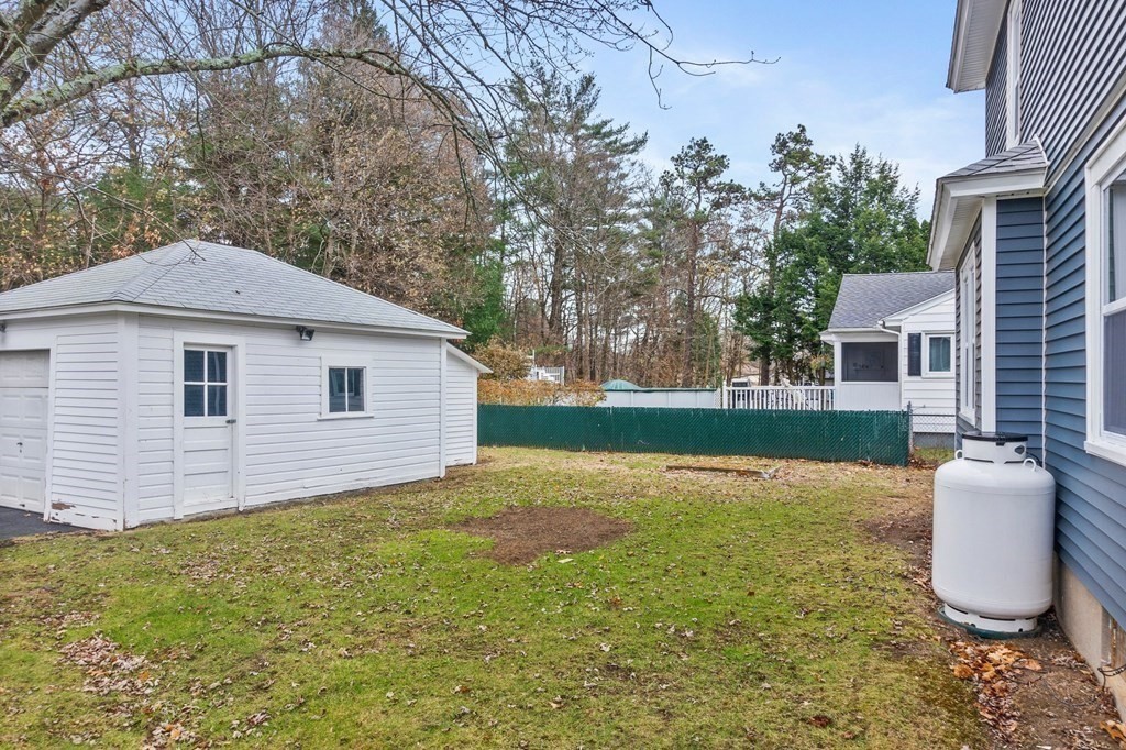 2191 Main Street Three Rivers, MA 01080 - Photo 42 of 42 a backyard of a house with table and chairs