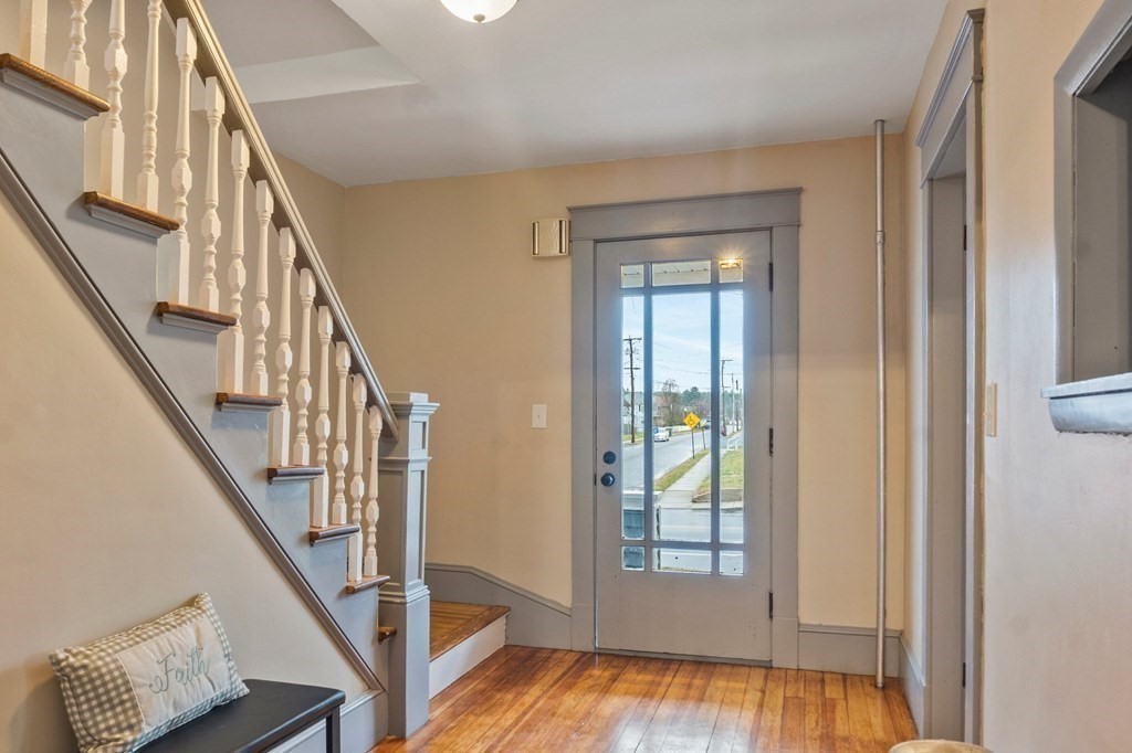 2191 Main Street Three Rivers, MA 01080 - Photo 6 of 42 a view of an entryway with wooden floor and door