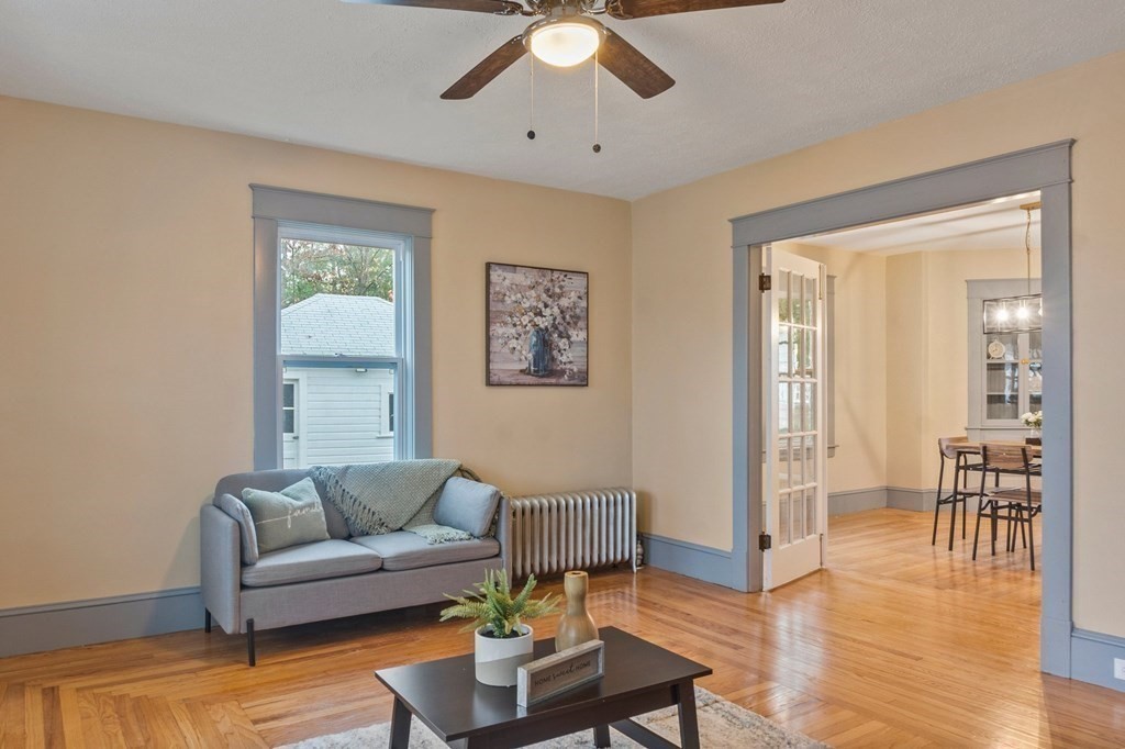 2191 Main Street Three Rivers, MA 01080 - Photo 7 of 42 a living room with furniture and a wooden floor