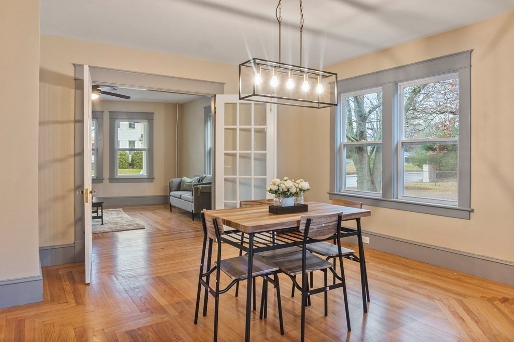2191 Main Street Three Rivers, MA 01080 - Photo 10 of 42 a view of a dining room with furniture window and wooden floor