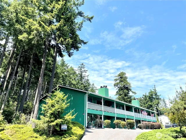 a house view with a garden space