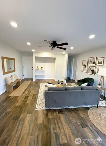 a living room with furniture and a couch
