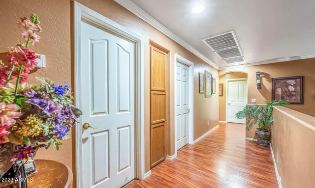 a entryway with furniture and flowers