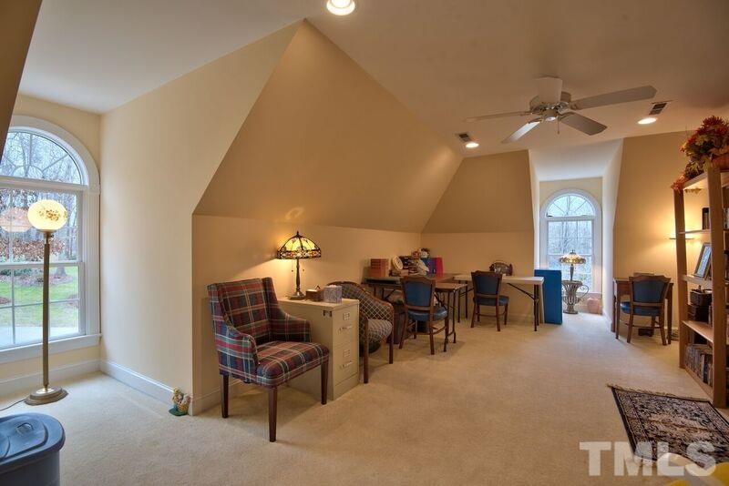 1815 Helena Moriah Road Timberlake, NC 27583 - Photo 17 of 23 a living room with lots of chairs and furniture
