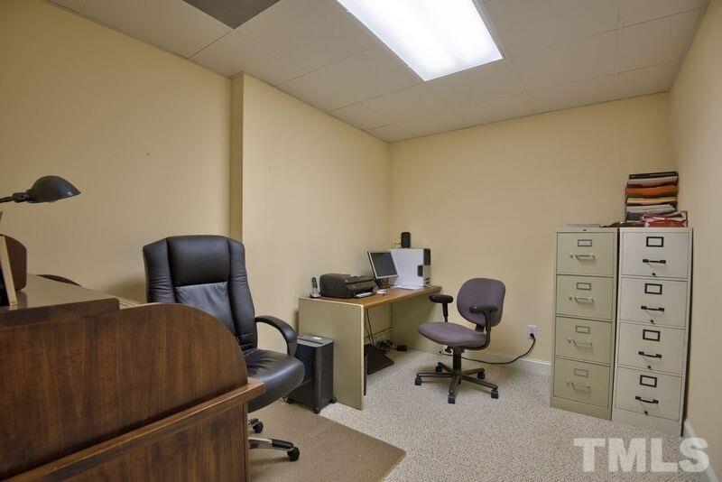 1815 Helena Moriah Road Timberlake, NC 27583 - Photo 21 of 23 a view of a workspace with furniture