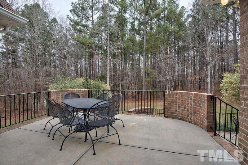 1815 Helena Moriah Road Timberlake, NC 27583 - Photo 6 of 23 a view of backyard with furniture and trees