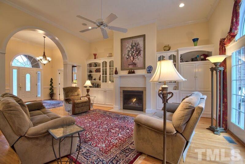 1815 Helena Moriah Road Timberlake, NC 27583 - Photo 10 of 23 a living room with furniture and a fireplace