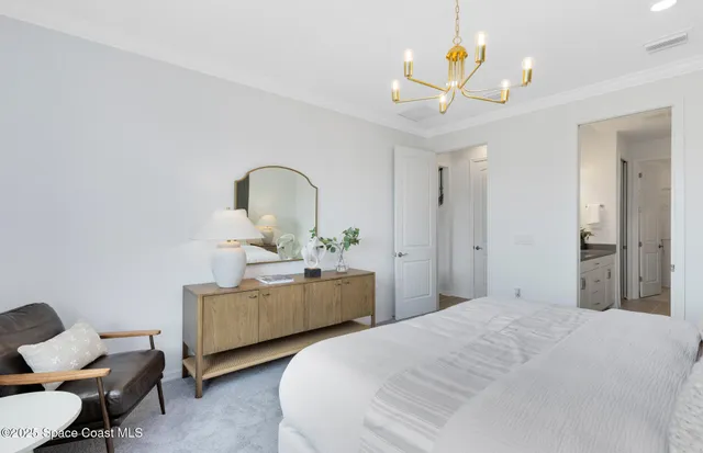 a bedroom with bed and window