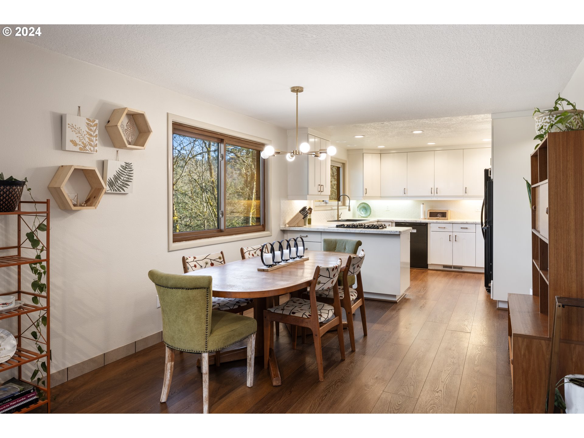 4335 Southwest Cullen Boulevard Portland, OR 97221 - Photo 11 of 46 a dining room with furniture and window