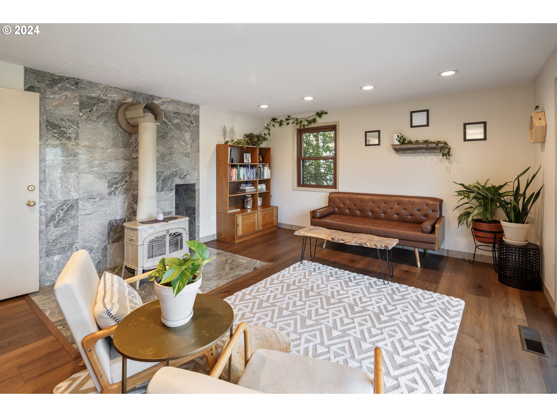 4335 Southwest Cullen Boulevard Portland, OR 97221 - Photo 13 of 46 a living room with furniture and wooden floor