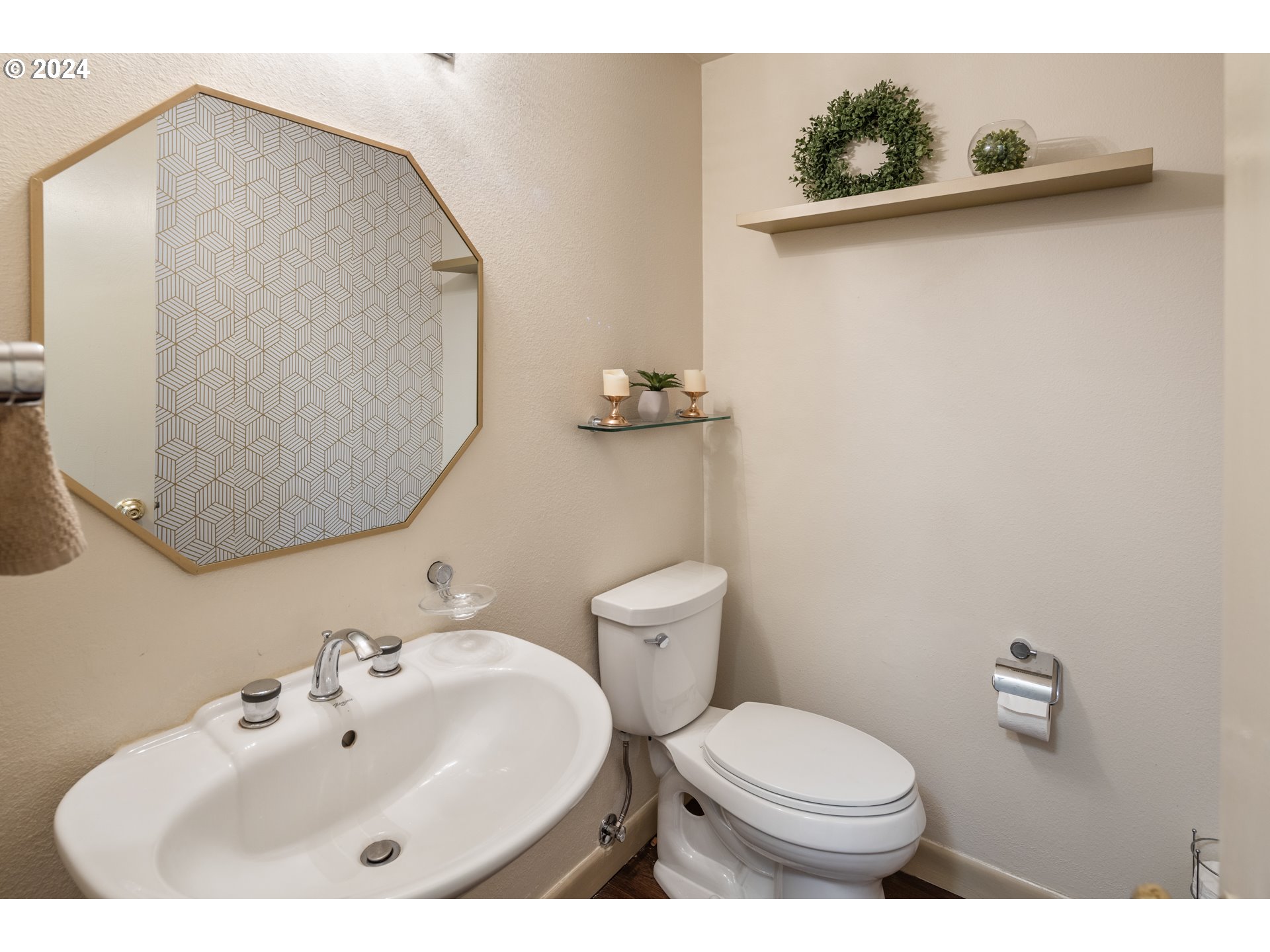4335 Southwest Cullen Boulevard Portland, OR 97221 - Photo 16 of 46 a bathroom with a sink mirror and toilet