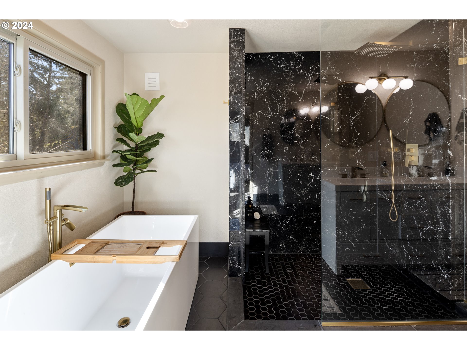 4335 Southwest Cullen Boulevard Portland, OR 97221 - Photo 19 of 46 a picture of a bathroom with a sink and mirror