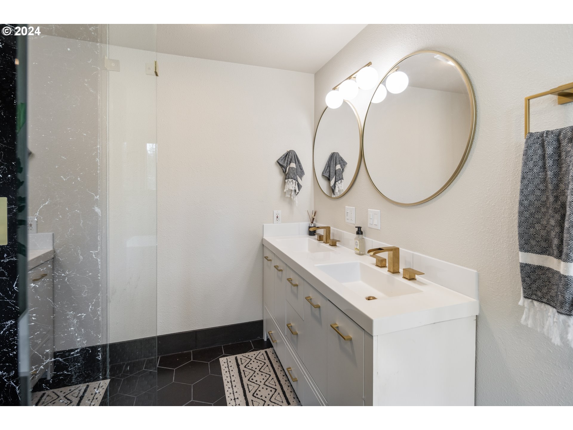 4335 Southwest Cullen Boulevard Portland, OR 97221 - Photo 20 of 46 a bathroom with a sink and a mirror