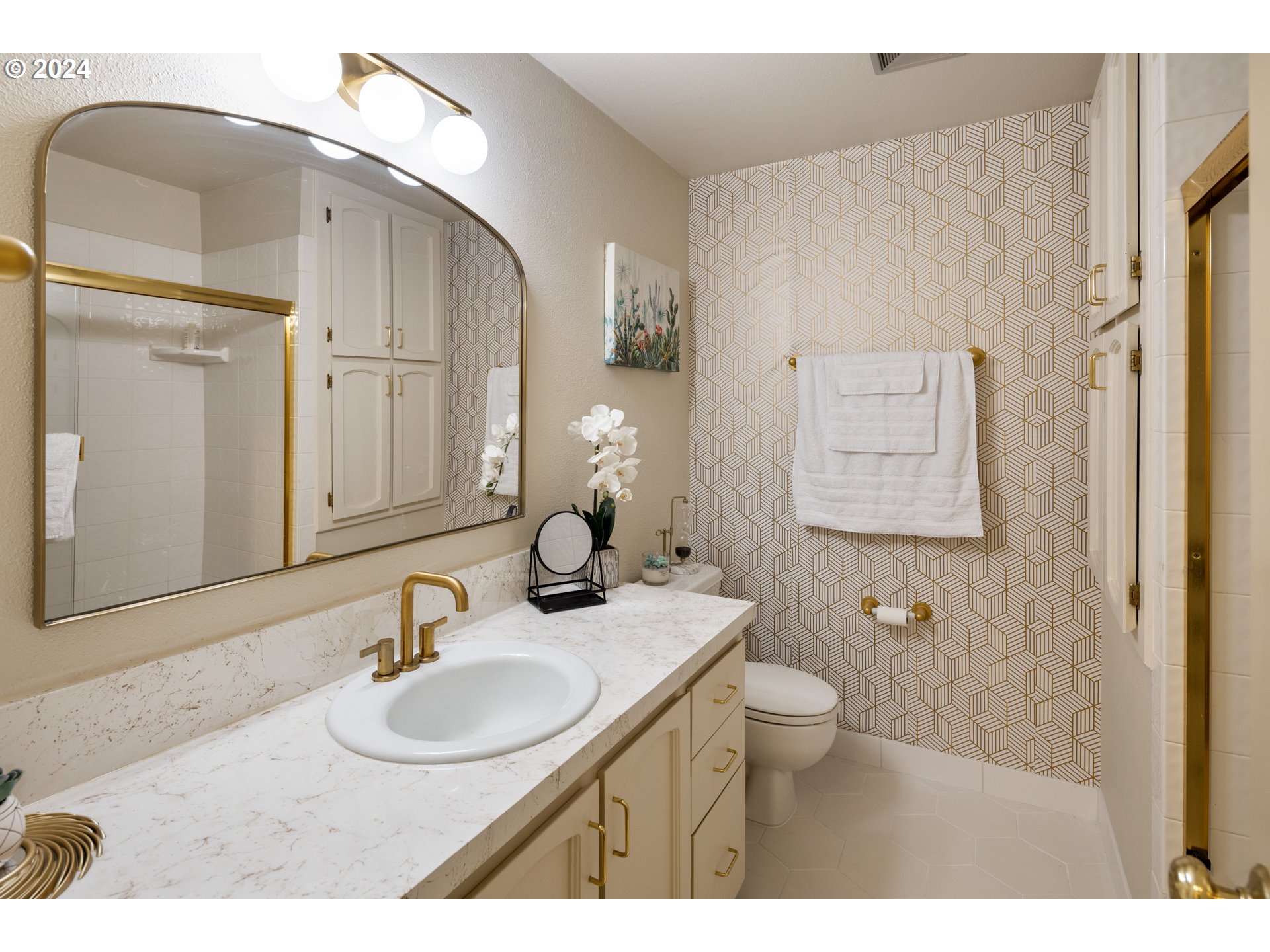 4335 Southwest Cullen Boulevard Portland, OR 97221 - Photo 24 of 46 a bathroom with a sink and a mirror