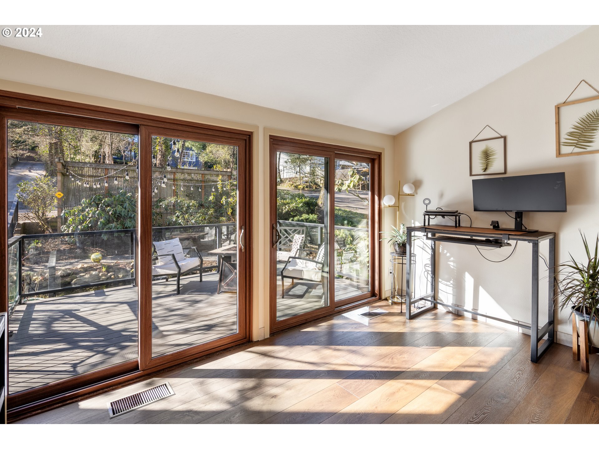 4335 Southwest Cullen Boulevard Portland, OR 97221 - Photo 7 of 46 a view of a living room and a floor to ceiling window
