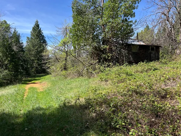 a view of outdoor space with a lake view