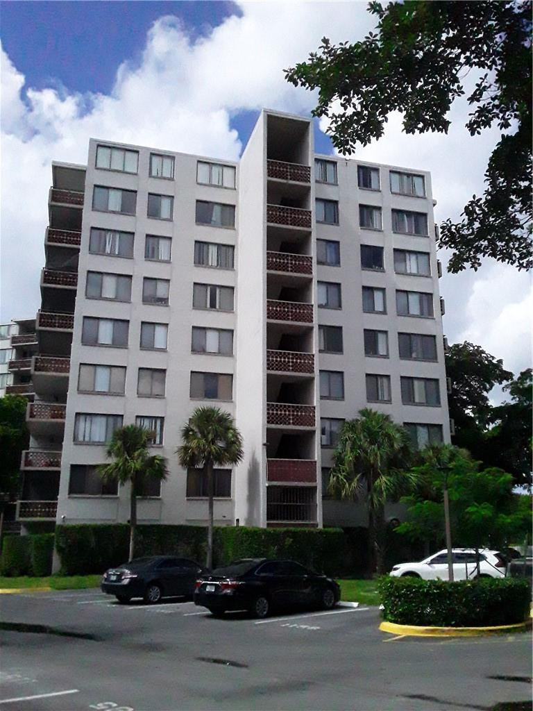 4222 Inverrary Boulevard, Unit 4610 Lauderhill, FL 33319 - Photo 2 of 32 a front view of a building and trees