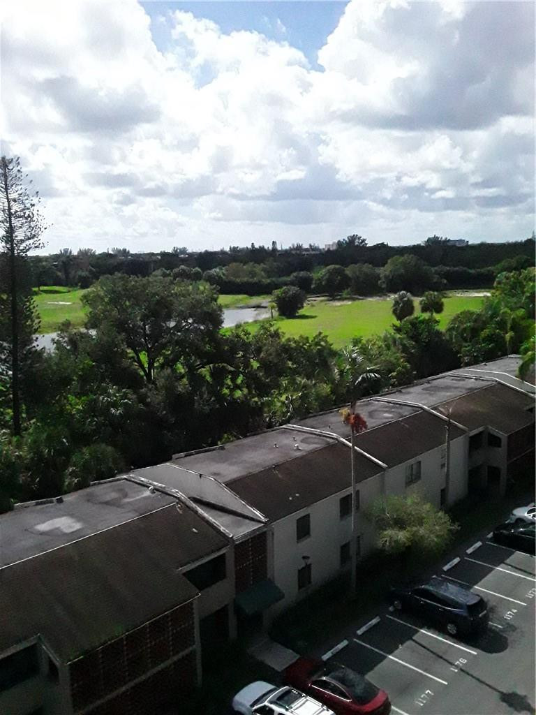 4222 Inverrary Boulevard, Unit 4610 Lauderhill, FL 33319 - Photo 31 of 32 a view of a patio in front of house