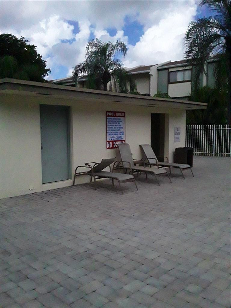 4222 Inverrary Boulevard, Unit 4610 Lauderhill, FL 33319 - Photo 9 of 32 a view of a car garage