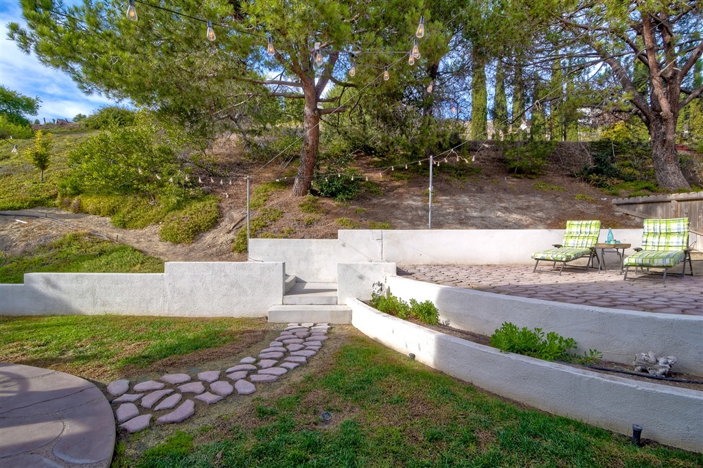 447 Mainsail Road Oceanside, CA 92054 - Photo 23 of 25 Cement Retaining Wall with hand made pavers!