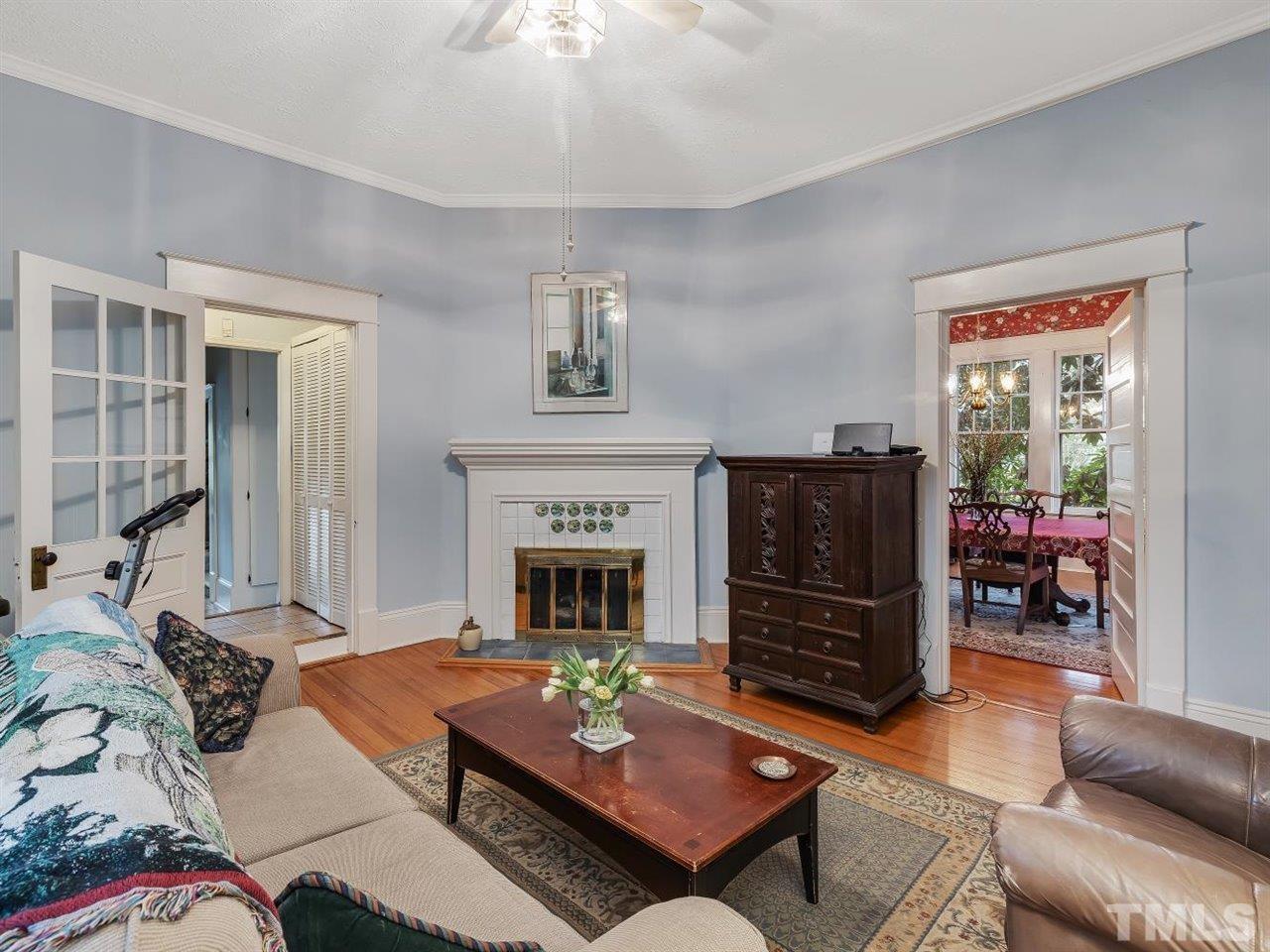 216 Hillcrest Road Raleigh, NC 27605 - Photo 13 of 49 a living room with furniture and a fireplace