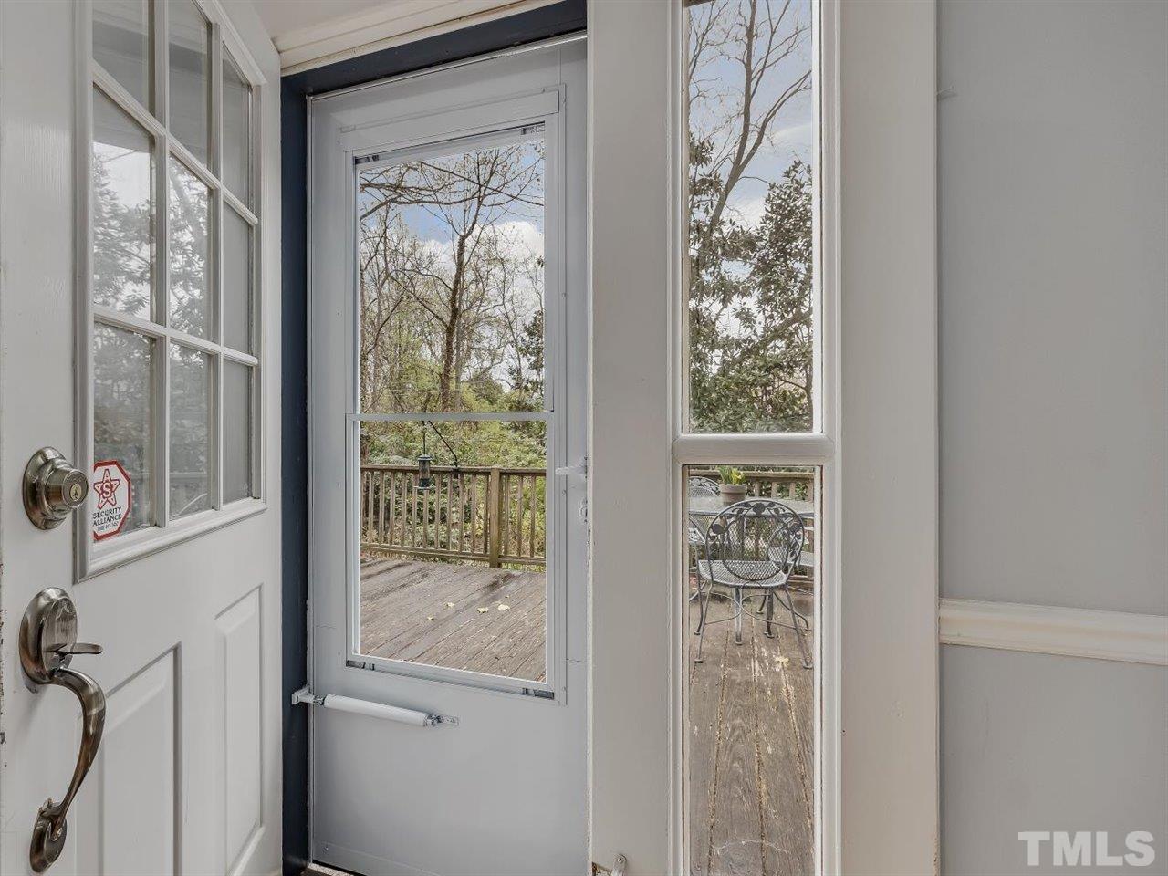 216 Hillcrest Road Raleigh, NC 27605 - Photo 20 of 49 a view of a glass door and a window