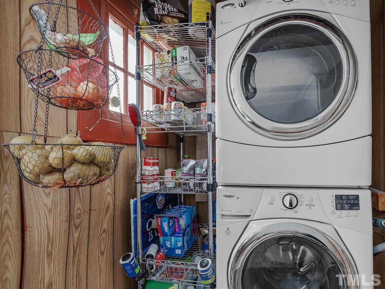 216 Hillcrest Road Raleigh, NC 27605 - Photo 25 of 49 a utility room with dryer and washer