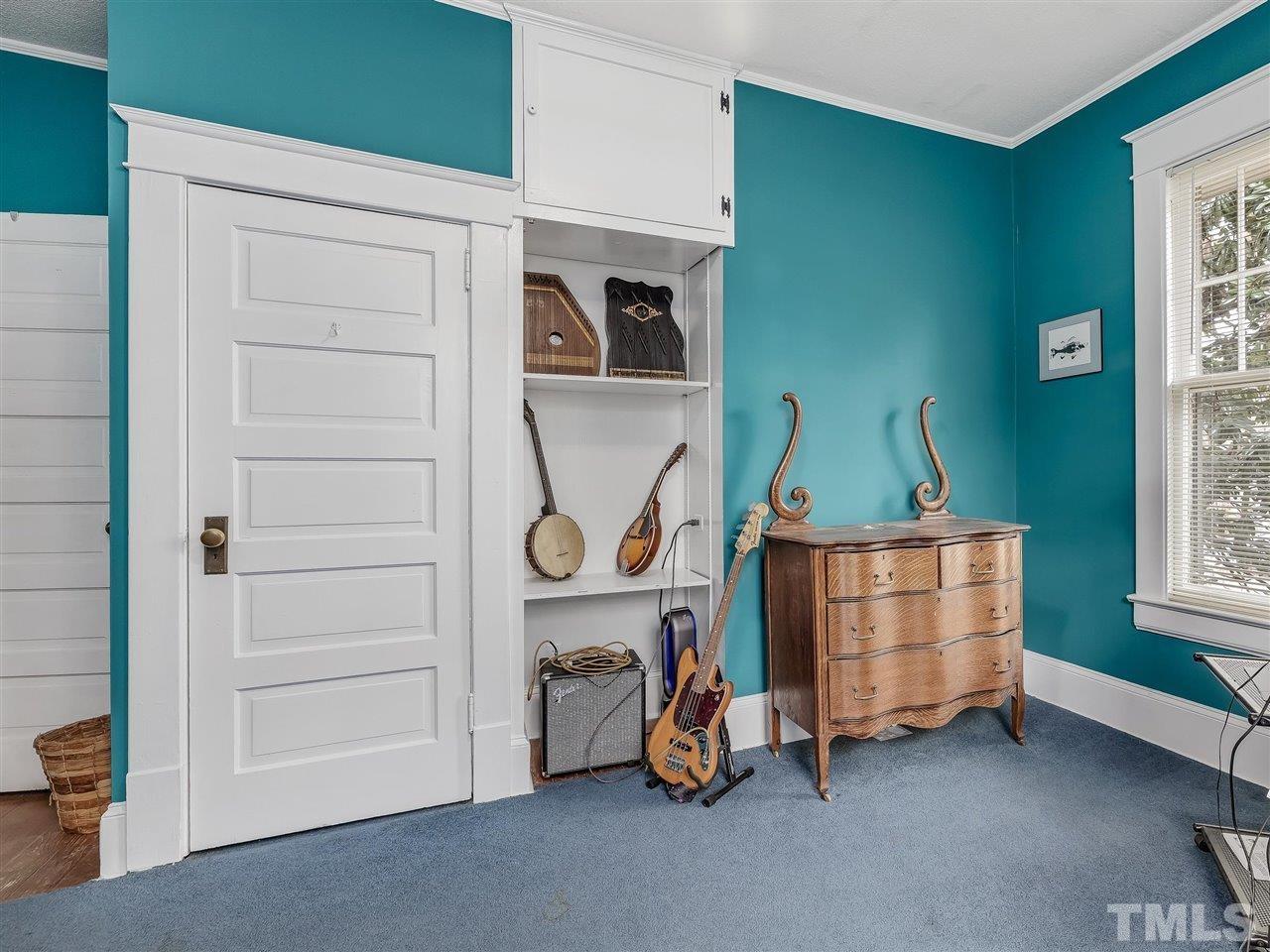 216 Hillcrest Road Raleigh, NC 27605 - Photo 37 of 49 a room with toys and a window