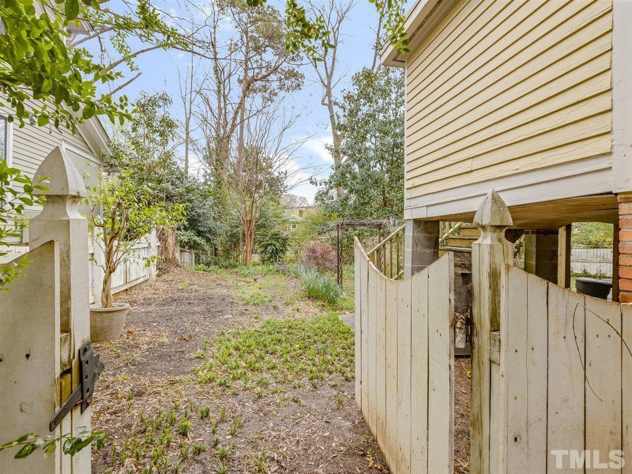 216 Hillcrest Road Raleigh, NC 27605 - Photo 40 of 49 a view of a pathway of a house