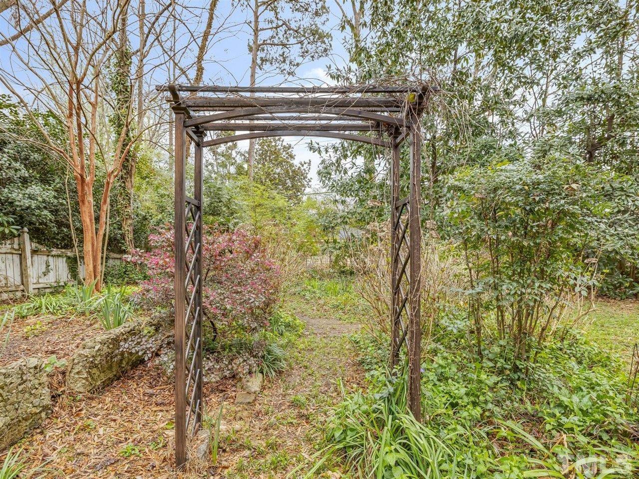 216 Hillcrest Road Raleigh, NC 27605 - Photo 42 of 49 a view of outdoor space and garden